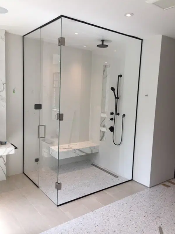 shower enclosure with frame fixing